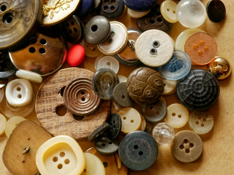 The Silent Storytellers: Decoding the Secret Language of Buttons in British Fashion